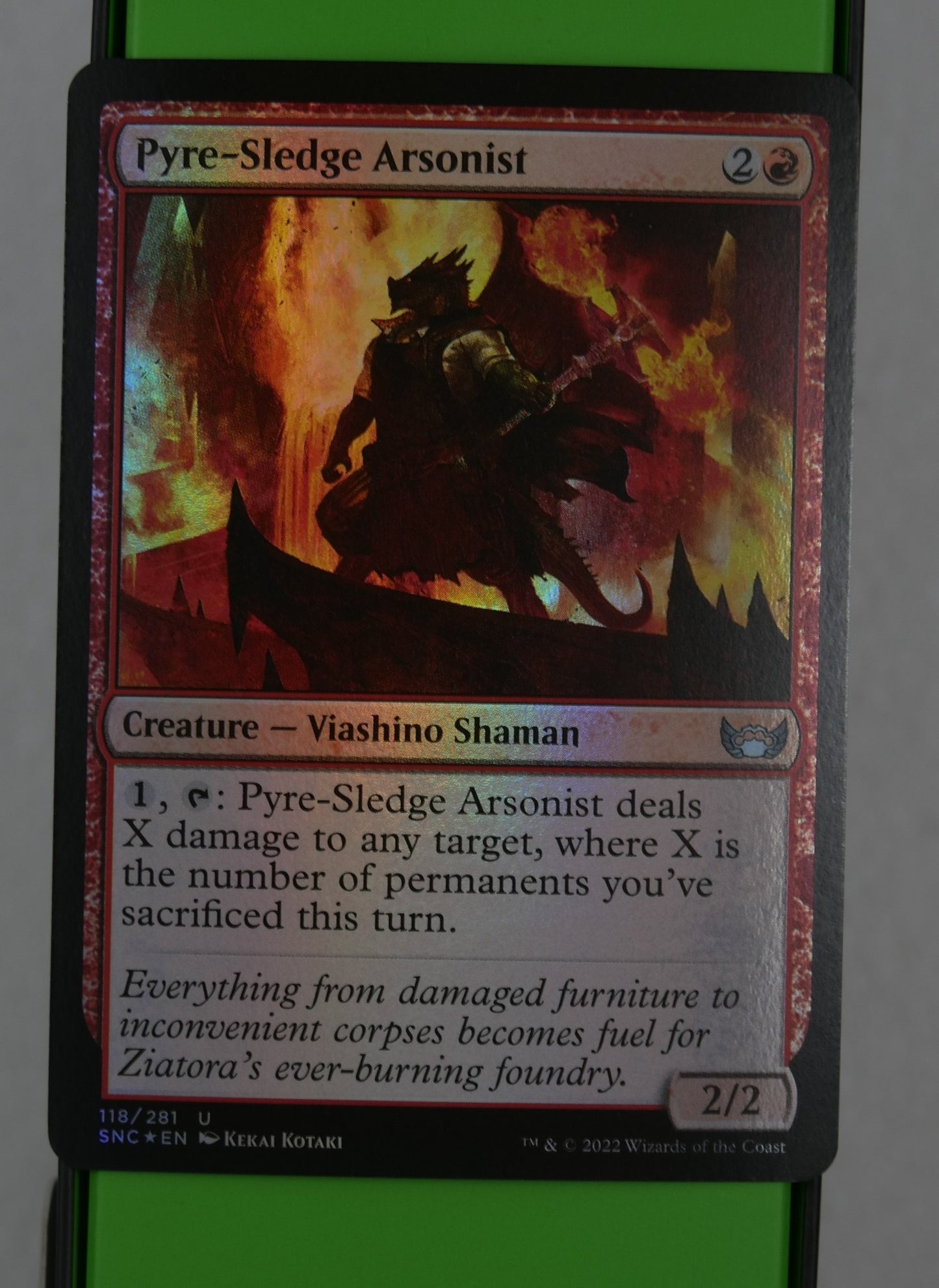 Pyre-Sledge Arsonist Magic: The Gathering card, Streets of New Capenna foil uncommon.