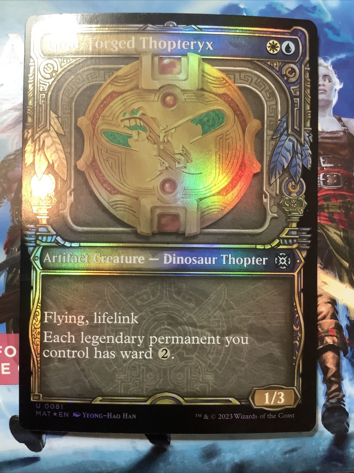 Gold-Forged Thopteryx Showcase Foil MTG card from March of the Machine Aftermath