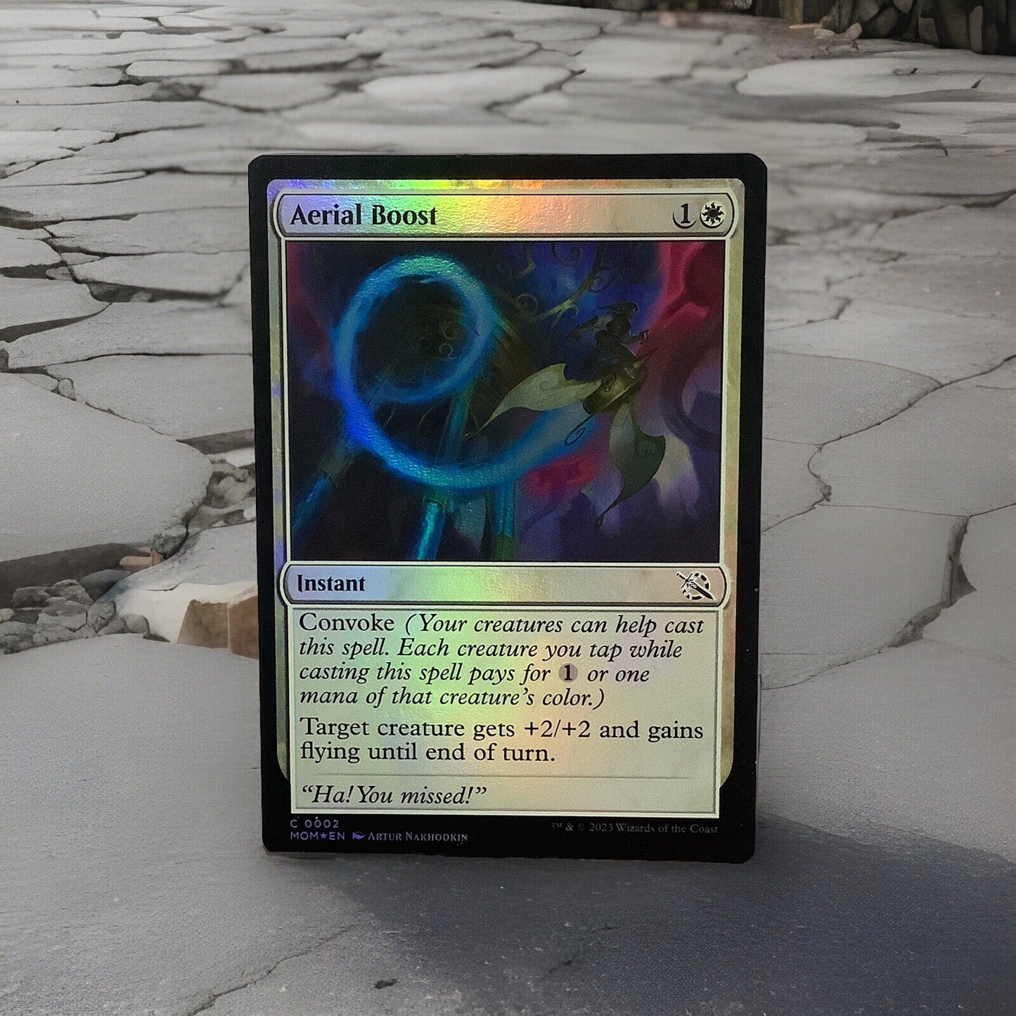 March of the Machine Aerial Boost #2 foil instant featuring convoke mechanics, combat tricks, and flying evasion synergies.