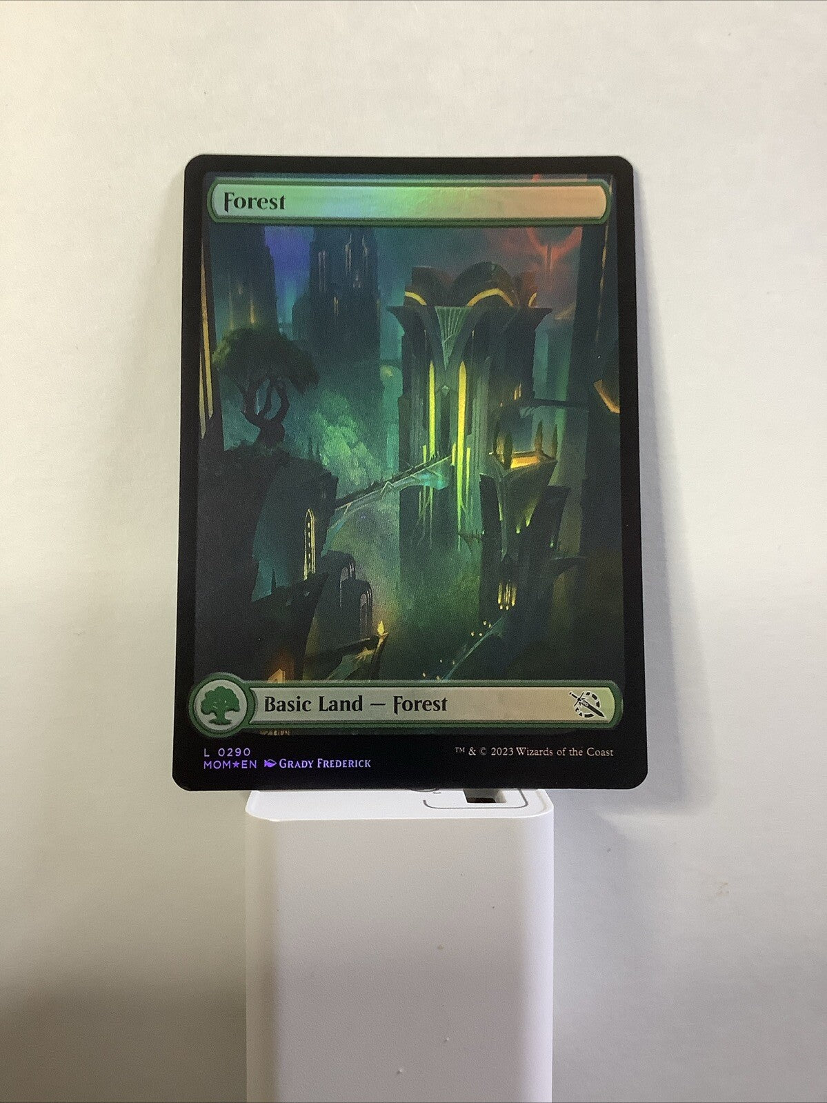 Forest Extended Art Foil from March of the Machine, card #290.