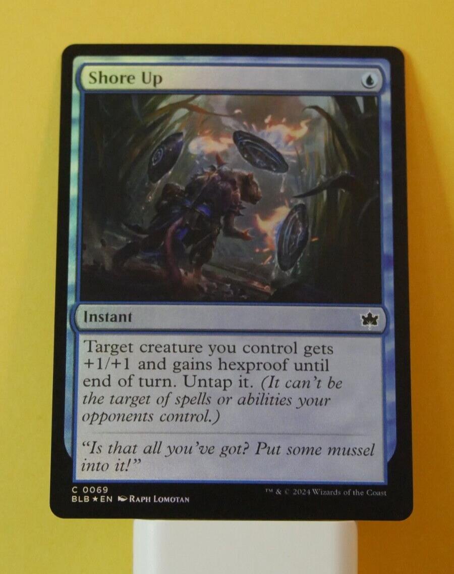 Shore Up foil instant card from Bloomburrow Magic the Gathering set, blue spell artwork featuring defensive magic