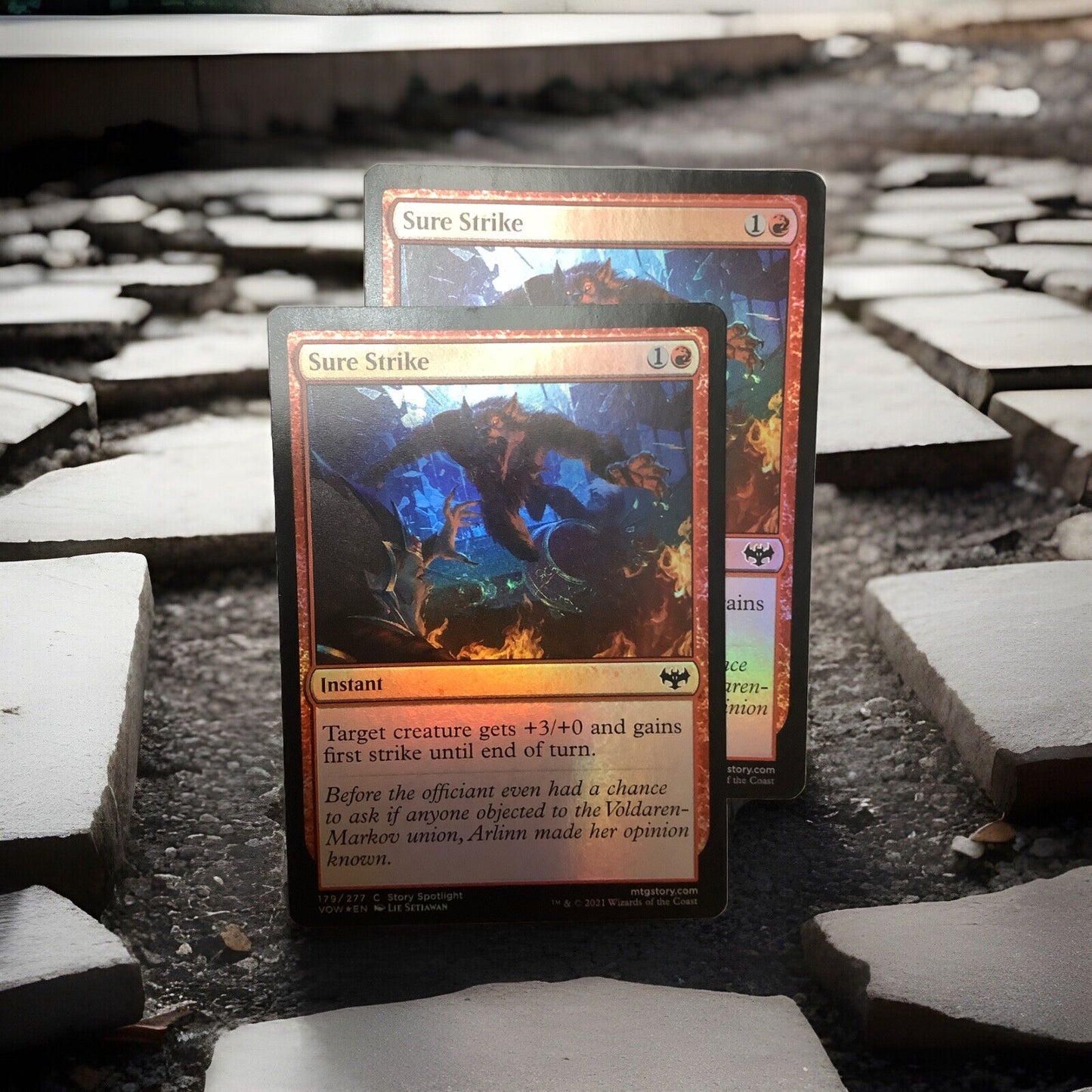 Two Sure Strike foil instant cards from VOW, card number 179/277, common