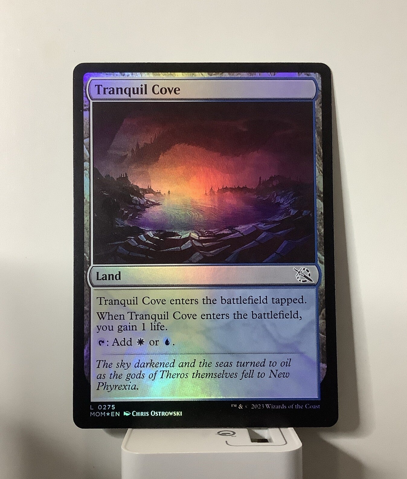 Tranquil Cove MOM 275 Foil from March of the Machine.