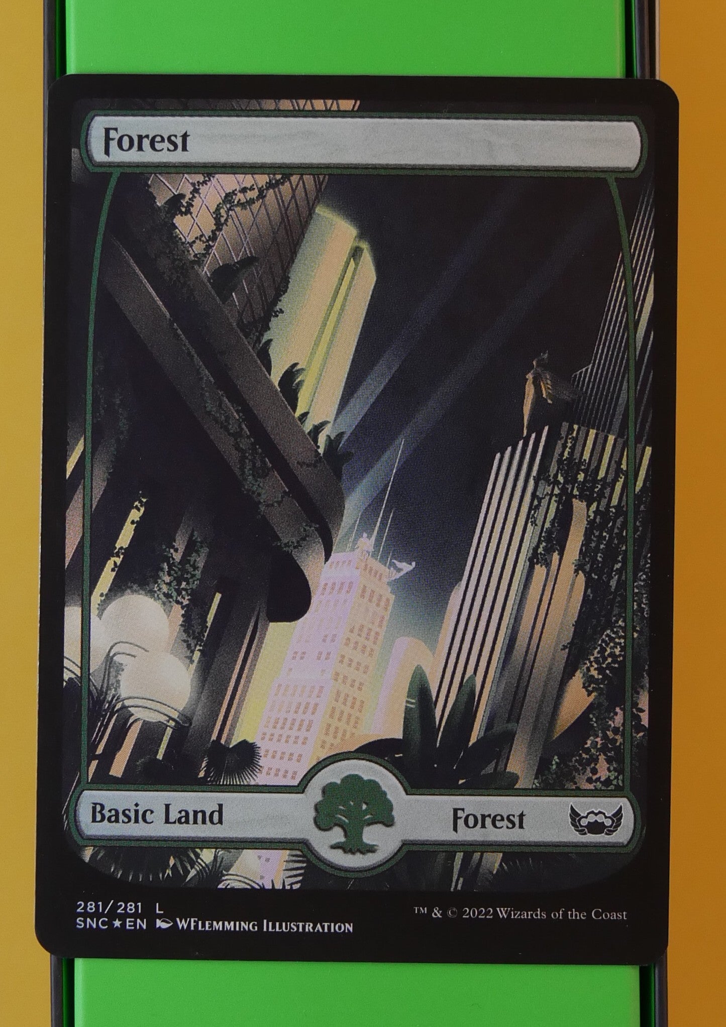 Foil Forest art-deco full-art basic land from Streets of New Capenna MTG