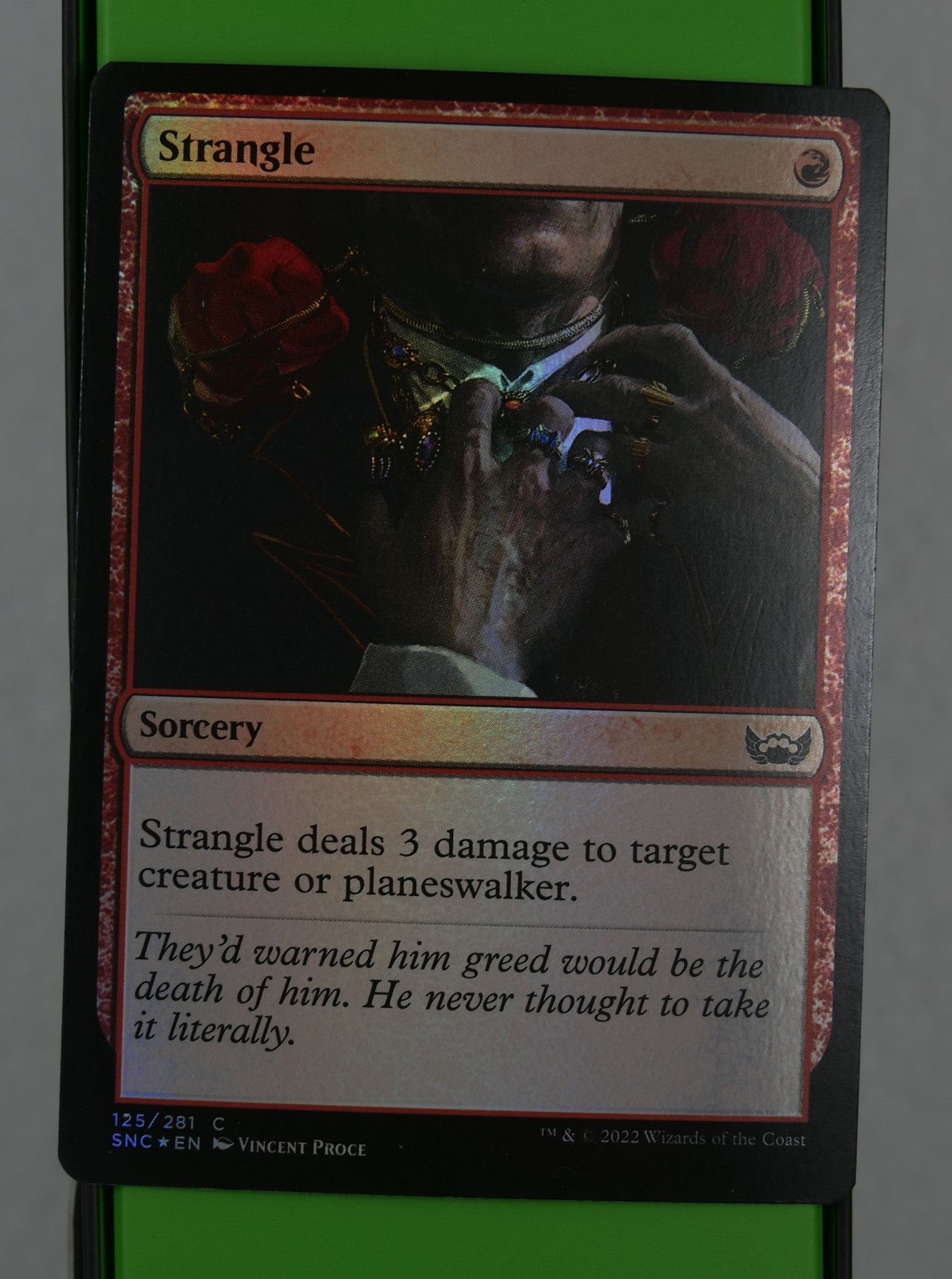Strangle SNC #125 Foil from Streets of New Capenna..
