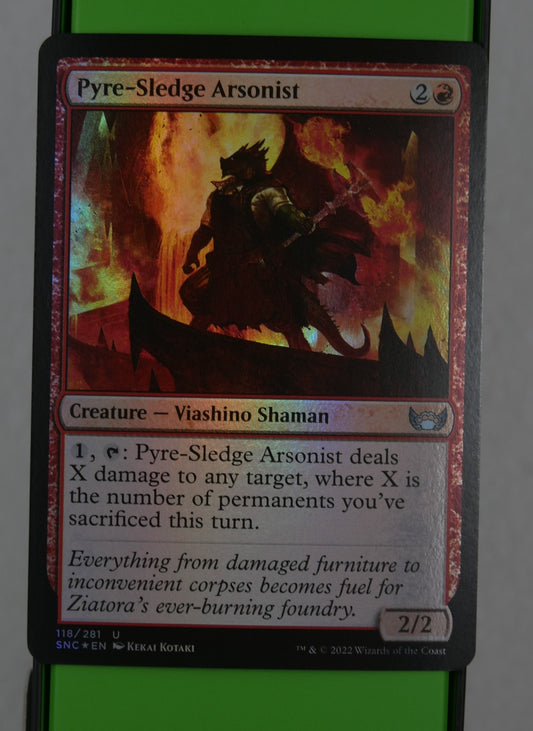 Pyre-Sledge Arsonist Magic: The Gathering card, Streets of New Capenna foil uncommon.

