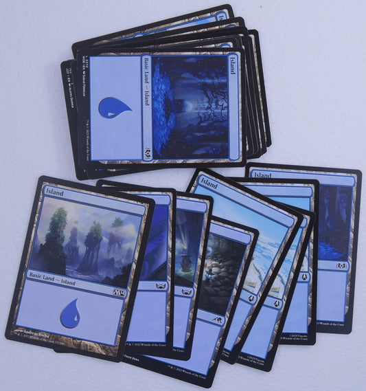 30 Magic the Gathering Island basic land cards with mixed artwork and printings
