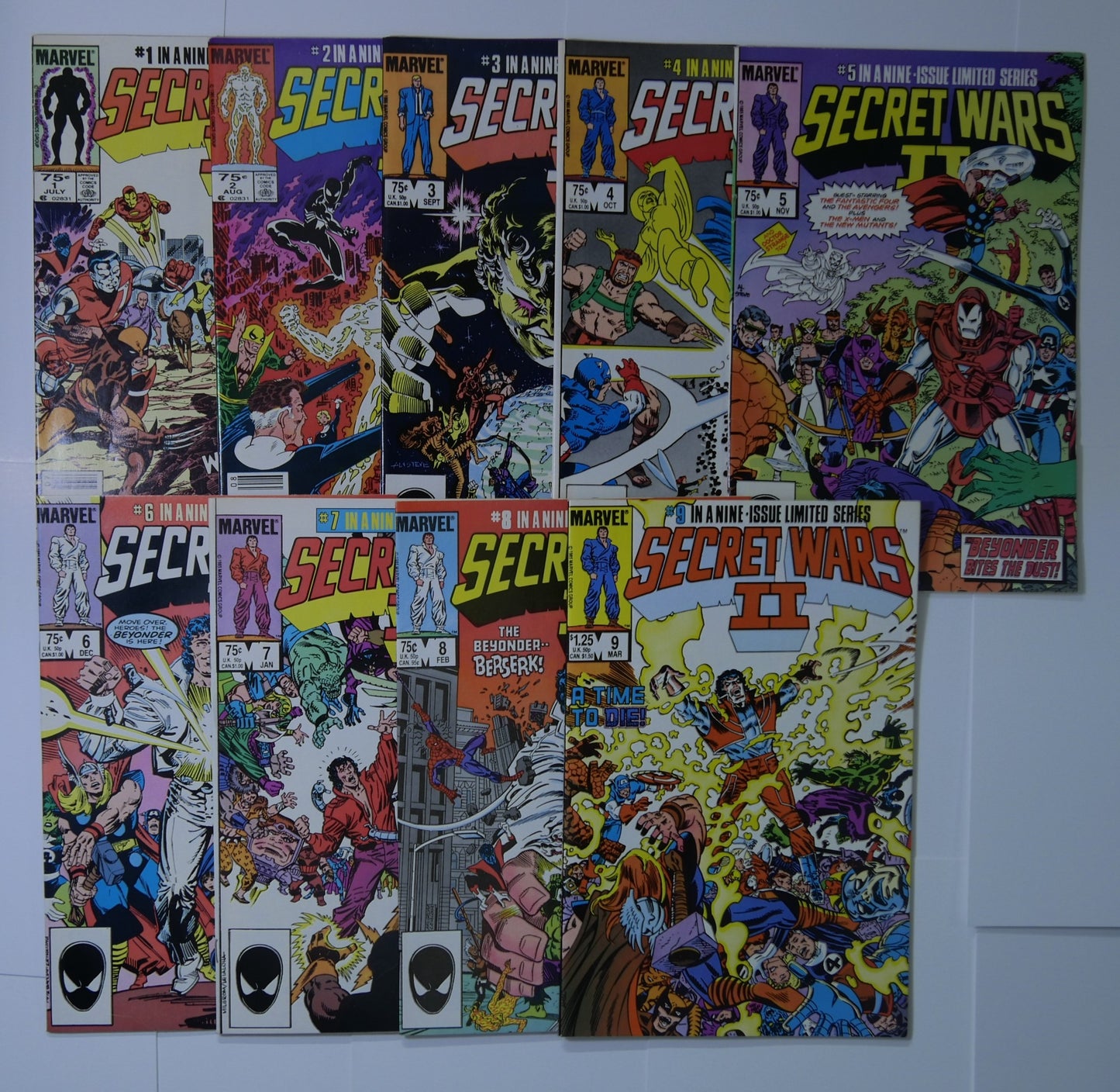 Secret Wars II complete set issues 1 through 9 from Marvel Comics displayed together
