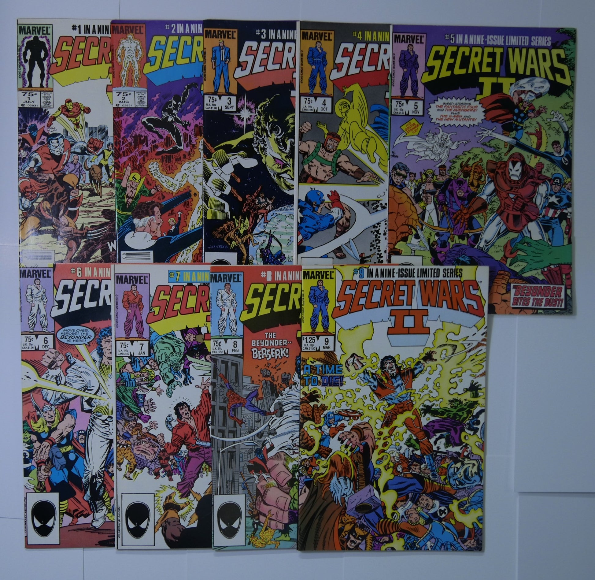 Secret Wars II complete set issues 1 through 9 from Marvel Comics displayed together