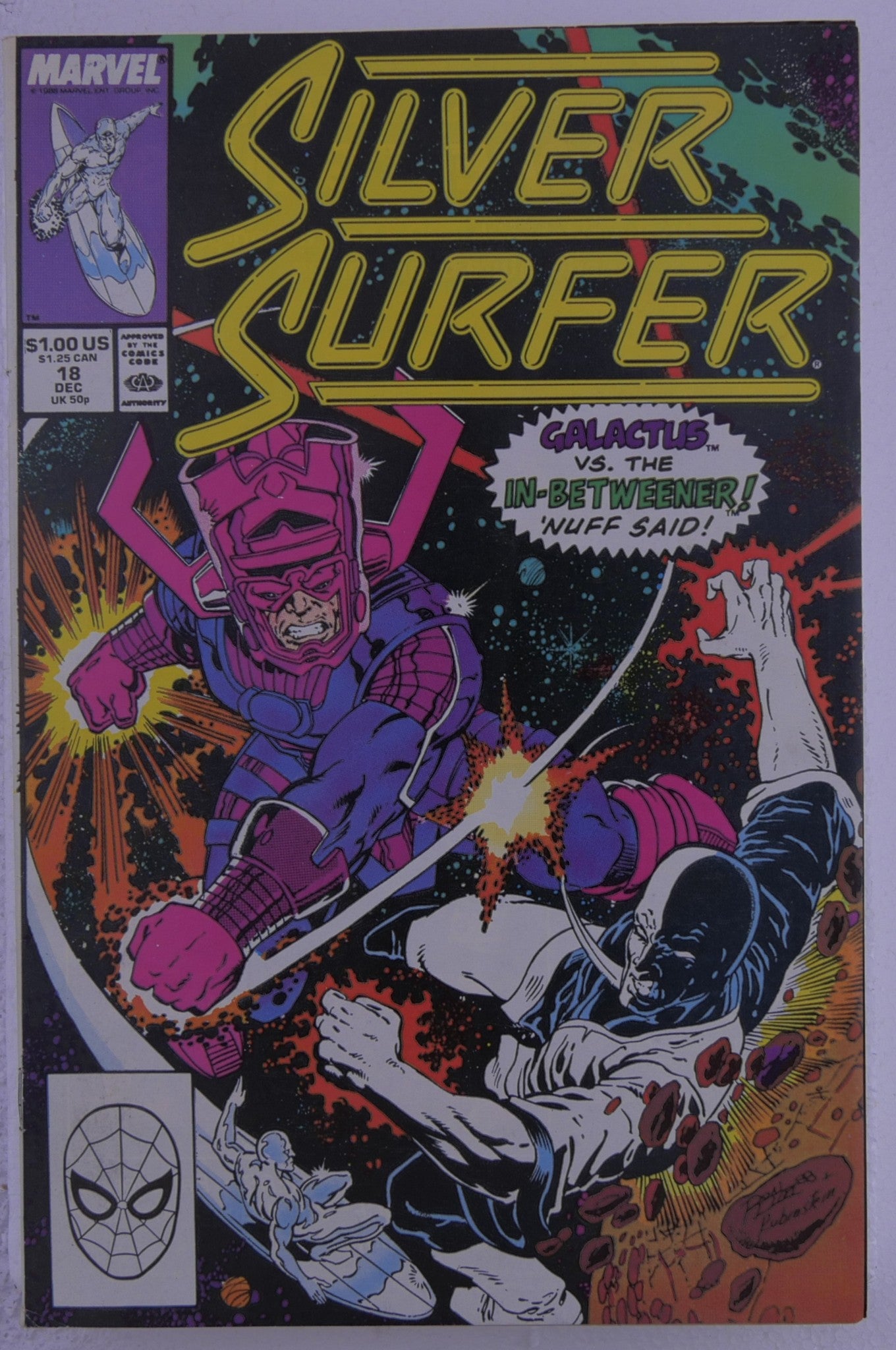 Silver Surfer #18 Marvel cover featuring Galactus fighting the Silver Surfer in space with cosmic debris and the title Silver Surfer at top.
