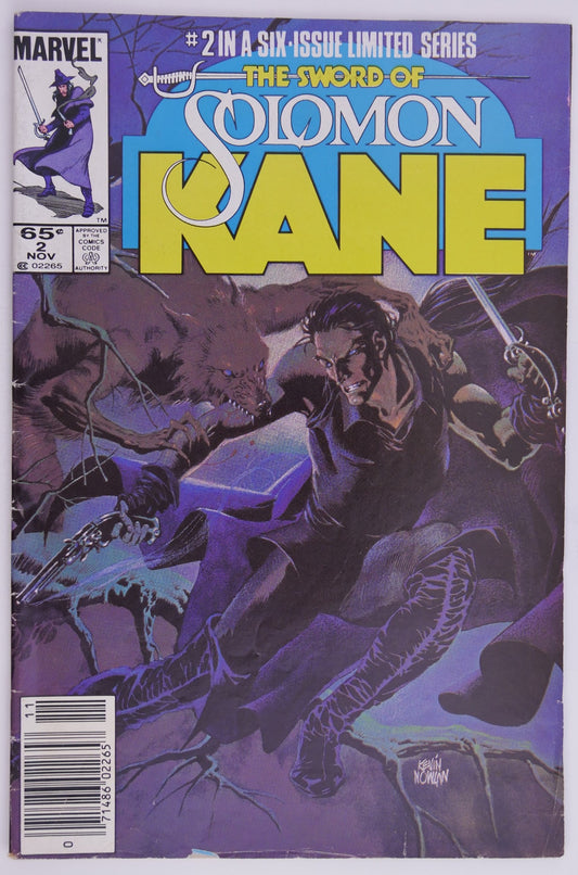 The Sword of Solomon Kane #2 1985 Marvel comic book cover featuring Solomon Kane battling a wolf-like creature in a dark forest scene.