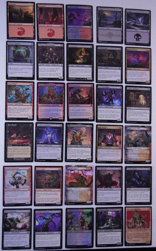 Grub, Storied Matriarch Rakdos sacrifice Commander bundle photo showing 30 MTG cards including Viscera Seer, Deadly Dispute, Squee, Dubious Monarch, and Geothermal Bog.