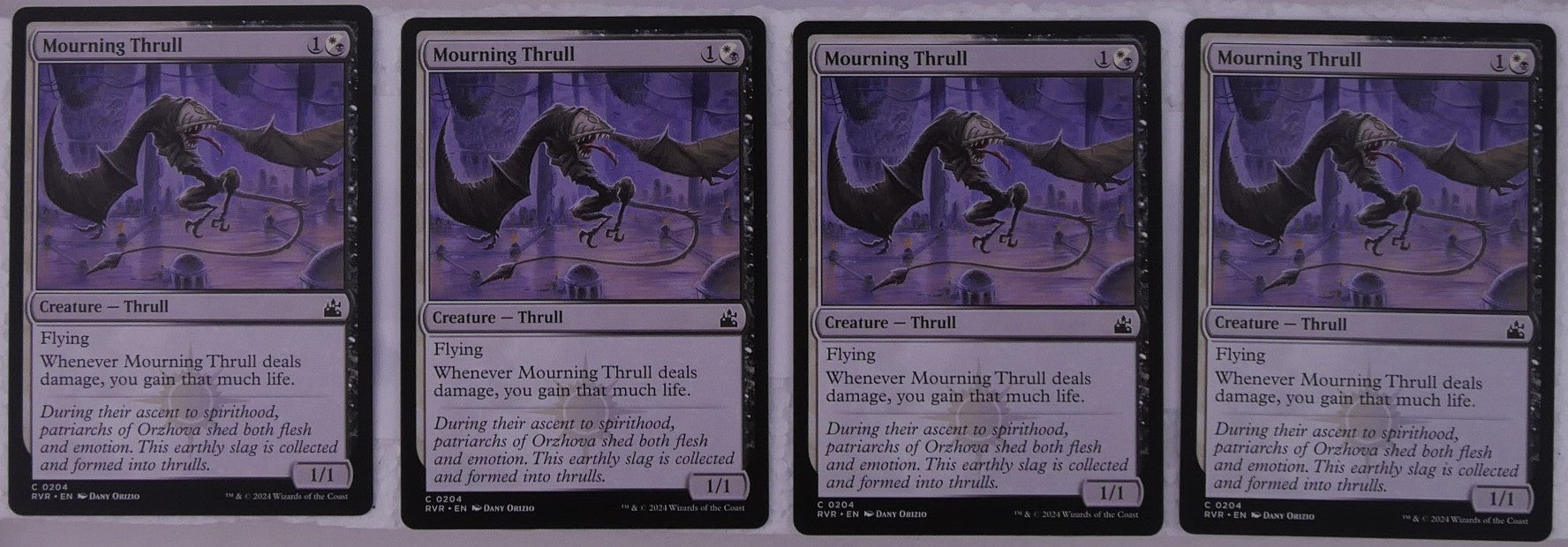 Four Mourning Thrull RVR 204 Magic the Gathering Thrull creature cards with flying and lifegain ability.