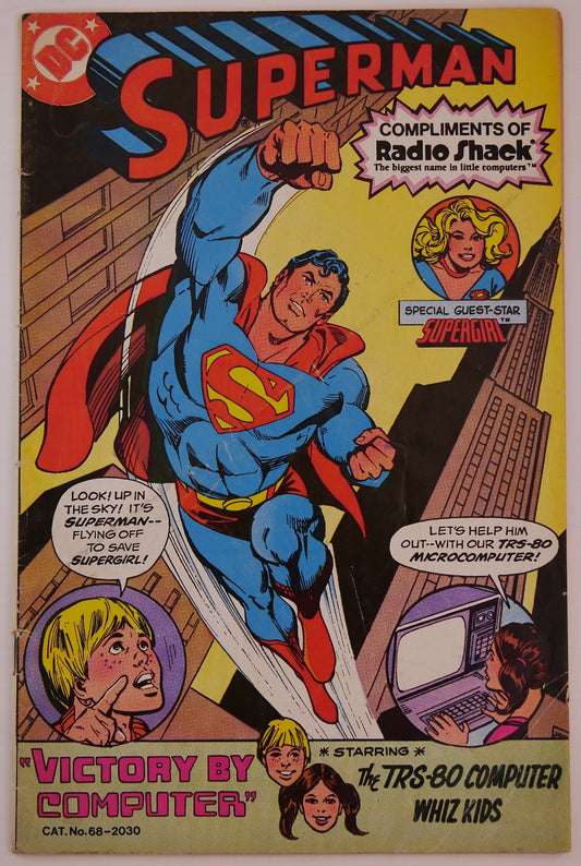 Cover of Superman Victory By Computer 1981 promotional comic featuring Superman, Supergirl, and Radio Shack TRS-80 computer branding.