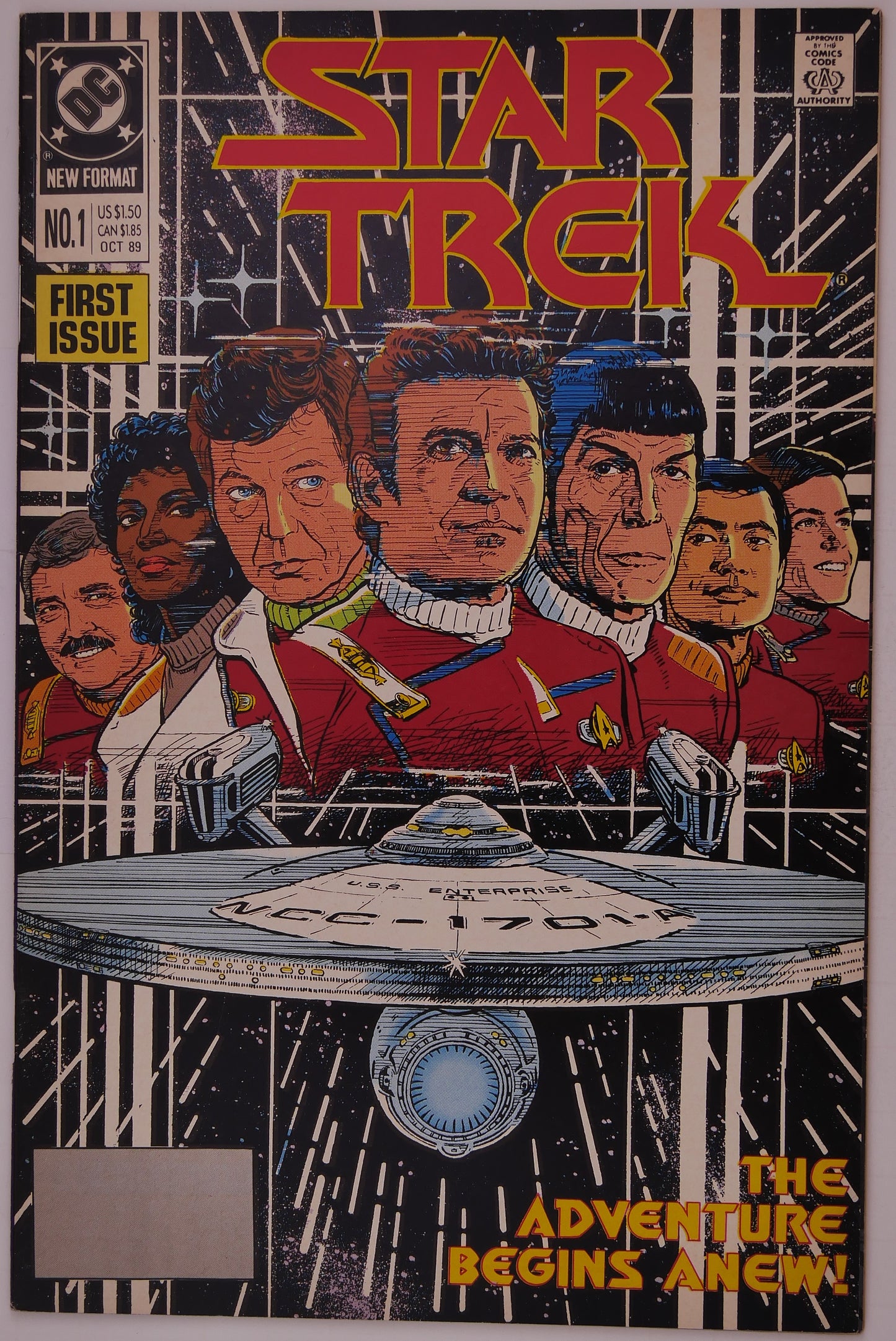 Star Trek #1 (1989) DC Comics comic book cover featuring Captain Kirk, Spock, and the USS Enterprise