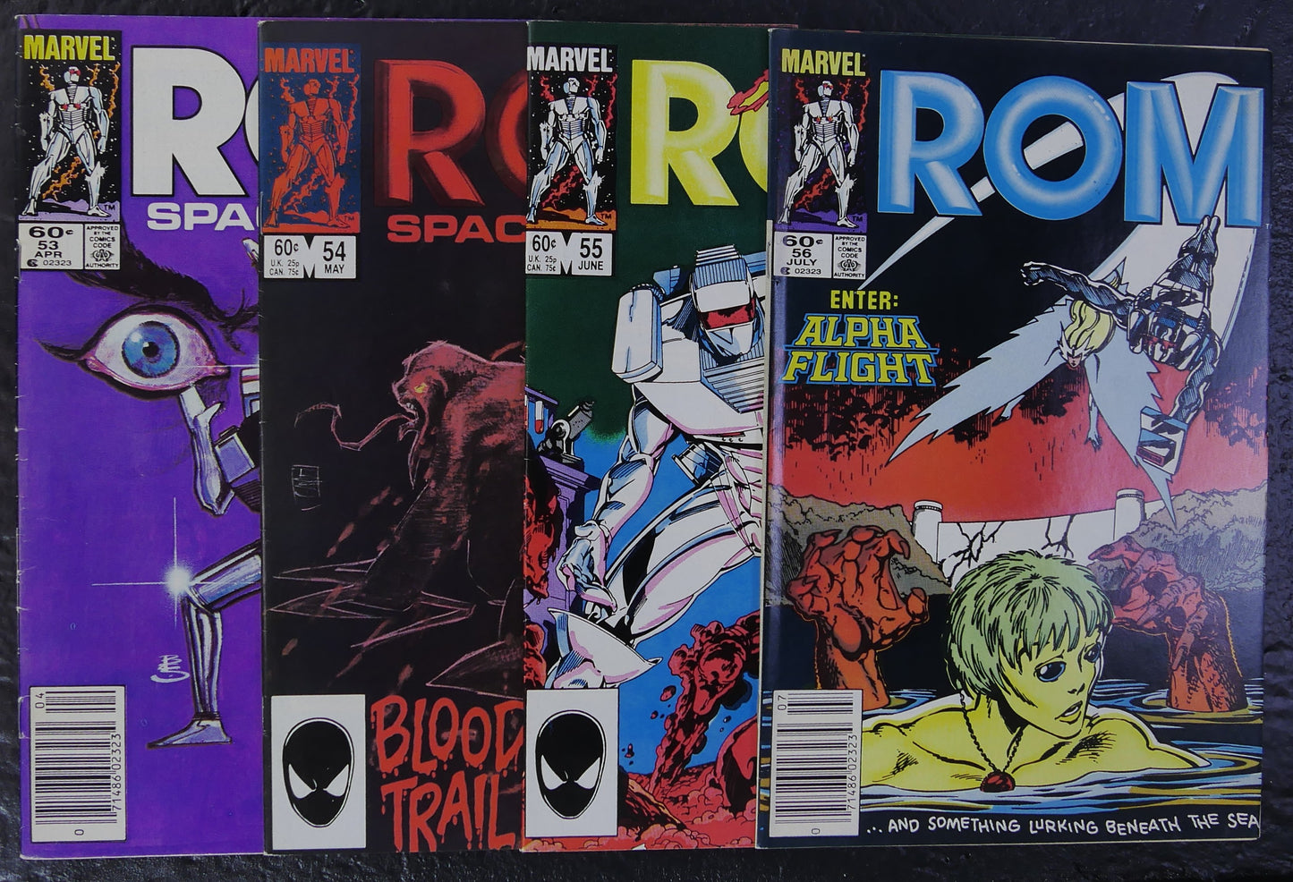 ROM #53-56 Marvel comic books from 1984 displayed together as a four-issue Wraith War bundle