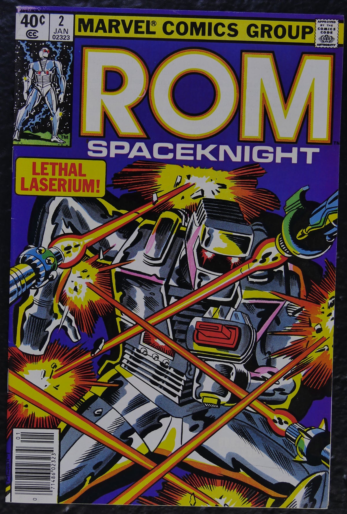 ROM #2 (1980) Marvel Comics newsstand comic book cover showing Rom under laser fire
