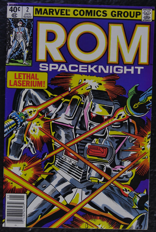 ROM #2 (1980) Marvel Comics newsstand comic book cover showing Rom under laser fire