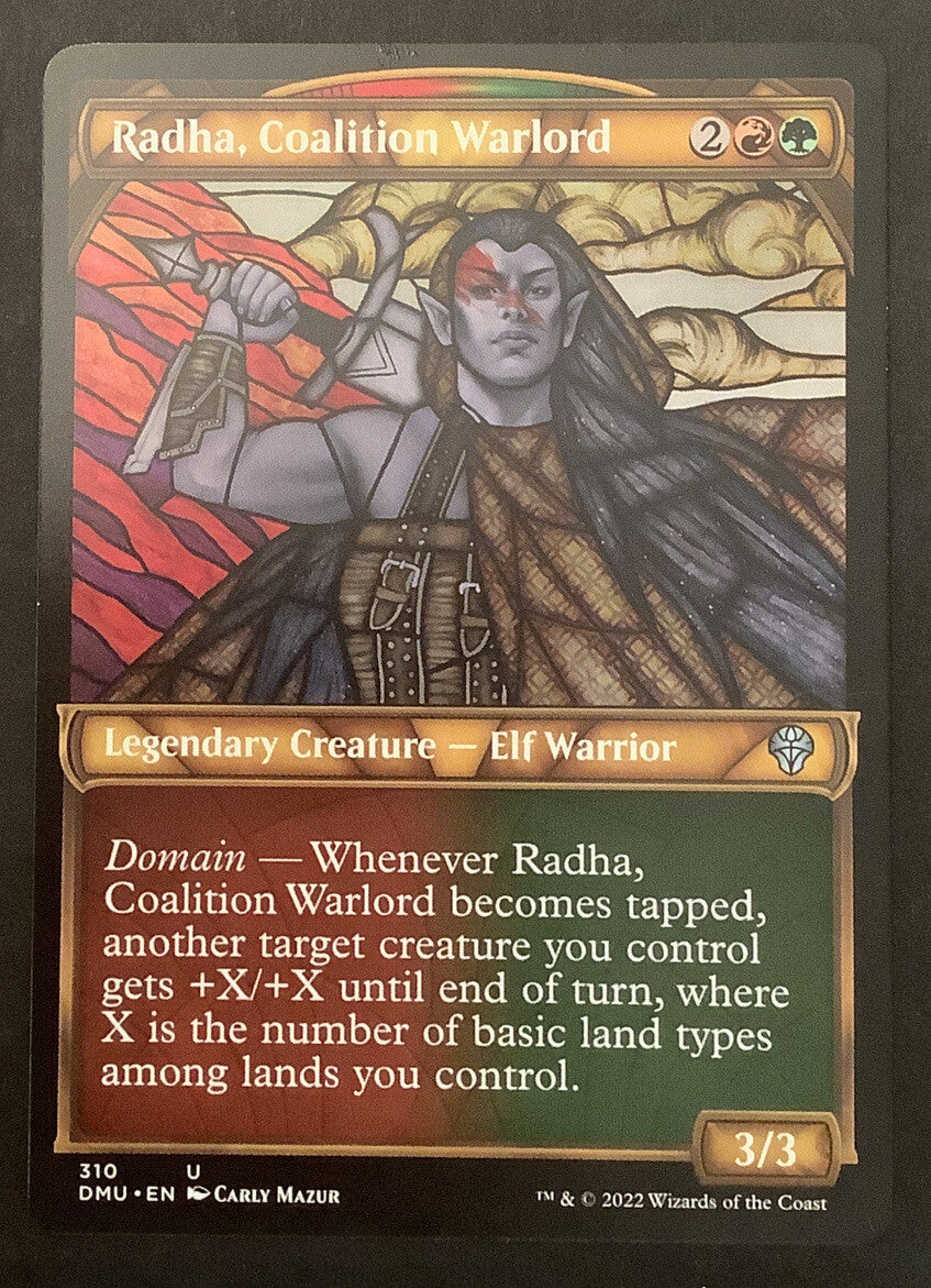 Radha, Coalition Warlord (Showcase) from Dominaria United (DMU) card #310.
