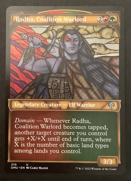 Radha, Coalition Warlord (Showcase) from Dominaria United (DMU) card #310.
