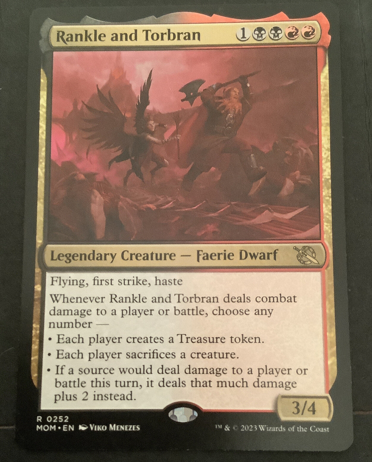 Rankle and Torbran from March of the Machine, card #252.