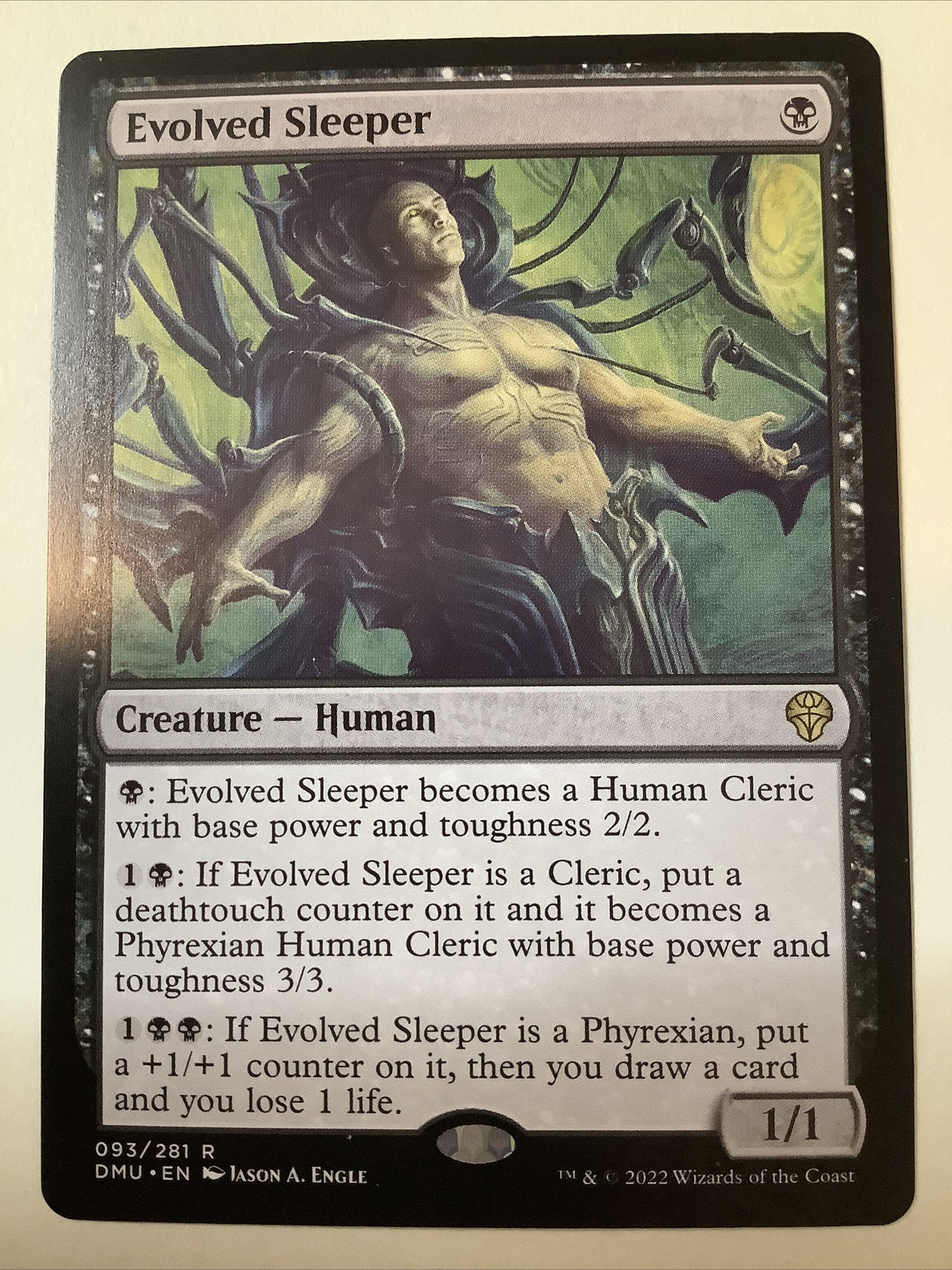 Evolved Sleeper Dominaria United rare black creature Magic card