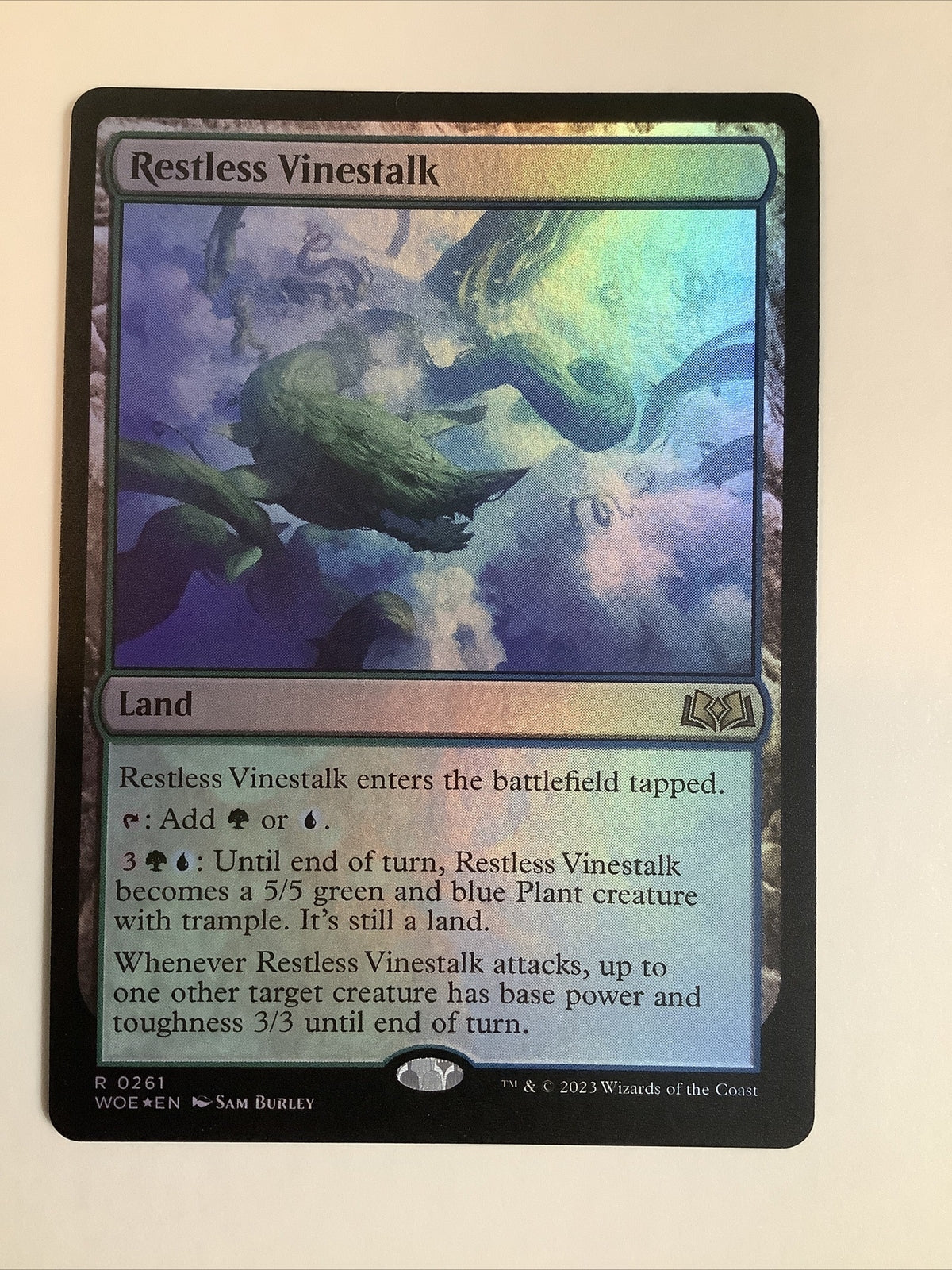 Foil Restless Vinestalk MTG card (WOE 261) Wilds of Eldraine land close-up
