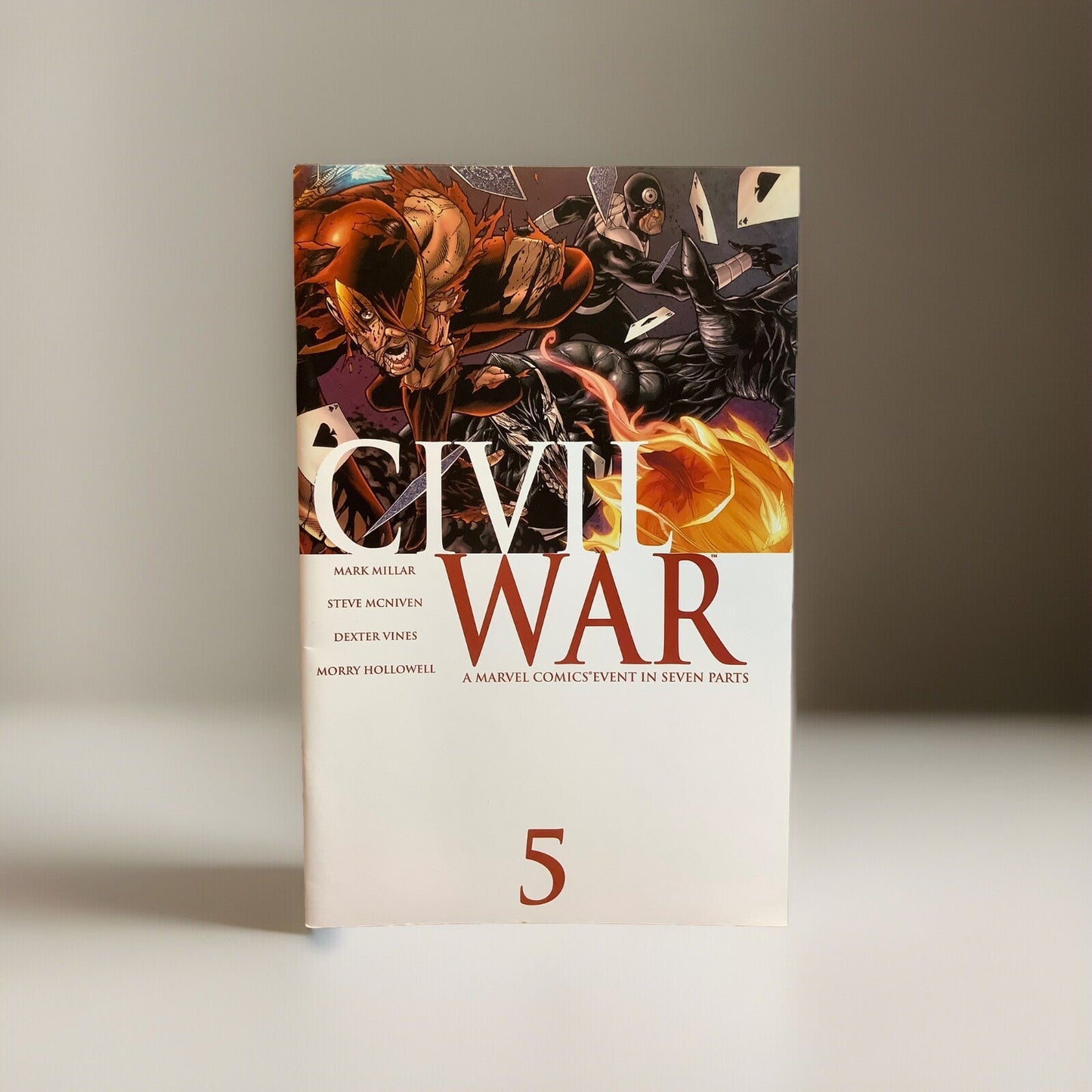 Cover of Civil War #5 Marvel Comics featuring Wolverine, Black Panther, and heroes in battle during the Civil War event.