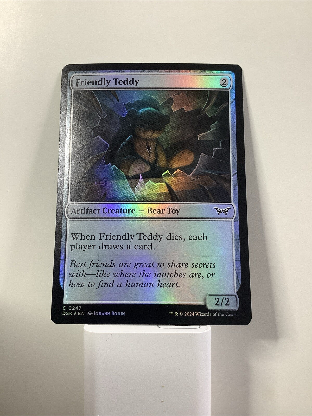 Friendly Teddy DSK #247 Foil from Duskmourn: House of Horror.