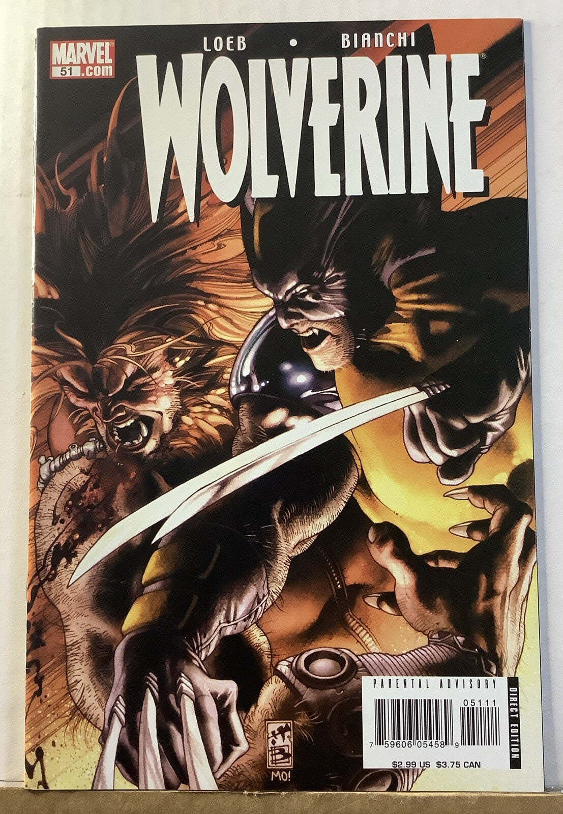 Wolverine #51 Marvel Comics April 2007 cover featuring Wolverine battling Sabretooth
