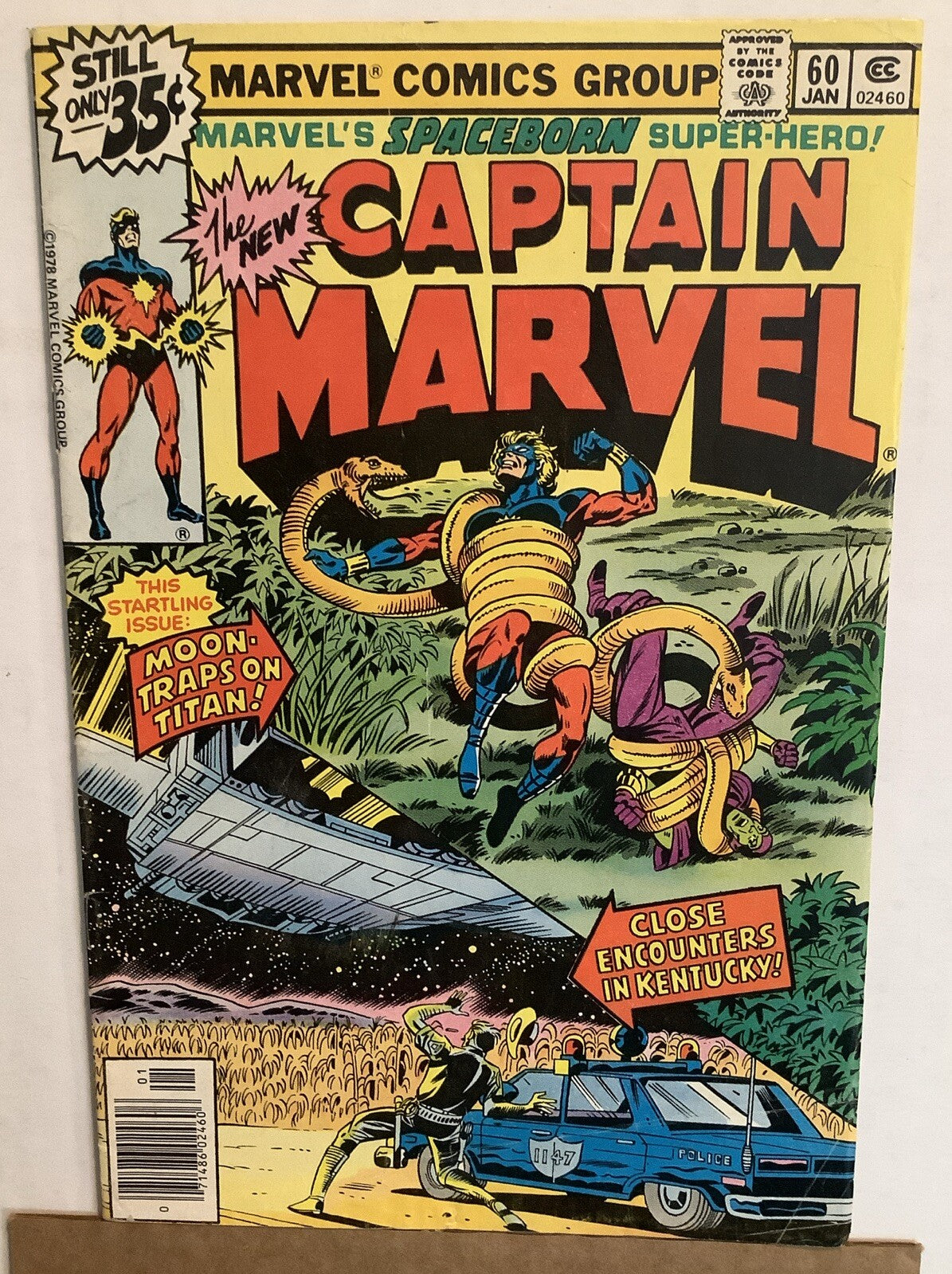 Cover of Captain Marvel #60 Marvel Comics 1979 featuring Captain Marvel battling giant serpents during a cosmic Titan storyline.