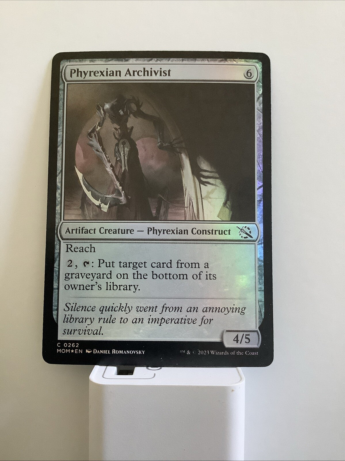 March of the Machine Phyrexian Archivist #262 foil artifact creature with graveyard control abilities.