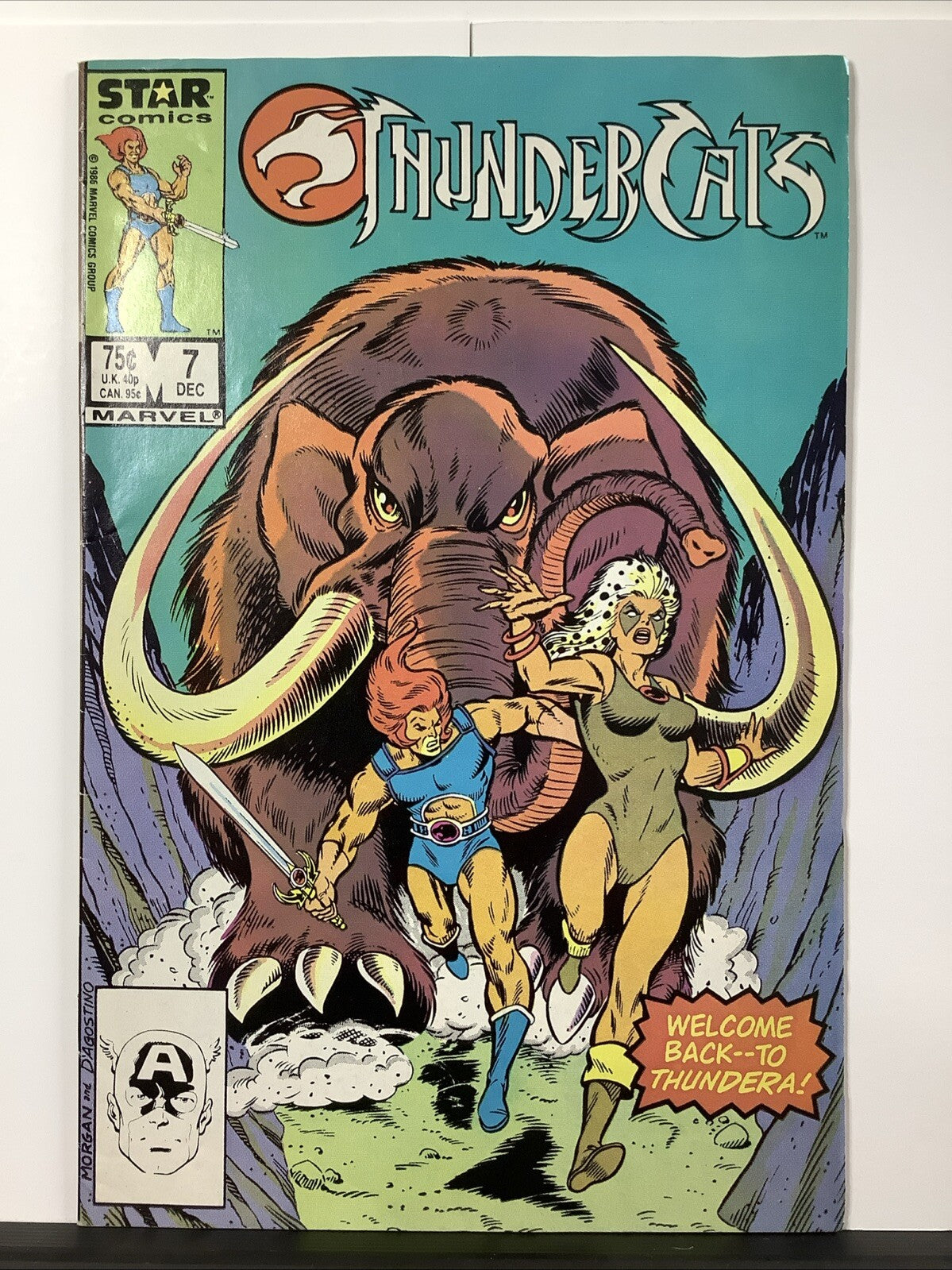 Thundercats #7 (1986) comic cover featuring Lion-O, Cheetara, and charging mammoth

