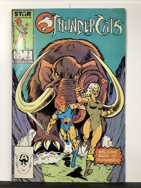 Thundercats #7 (1986) comic cover featuring Lion-O, Cheetara, and charging mammoth
