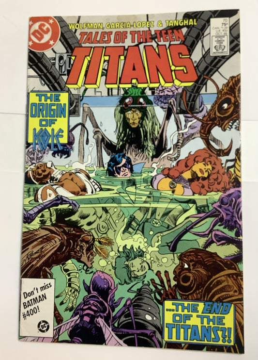 Tales of the Teen Titans #70 cover showing the Titans submerged in a lab with Kole’s origin teased
