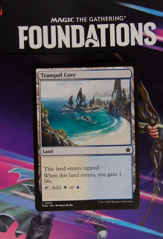 Foundations Tranquil Cove #270 featuring white-blue mana fixing, life gain, and dependable dual land utility.