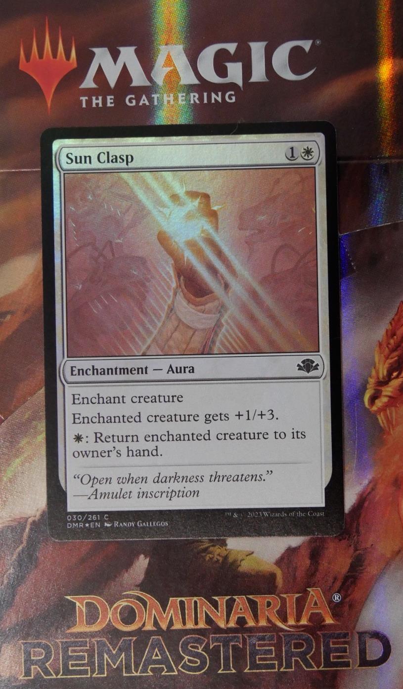 Sun Clasp #30 Foil from Dominaria Remastered.