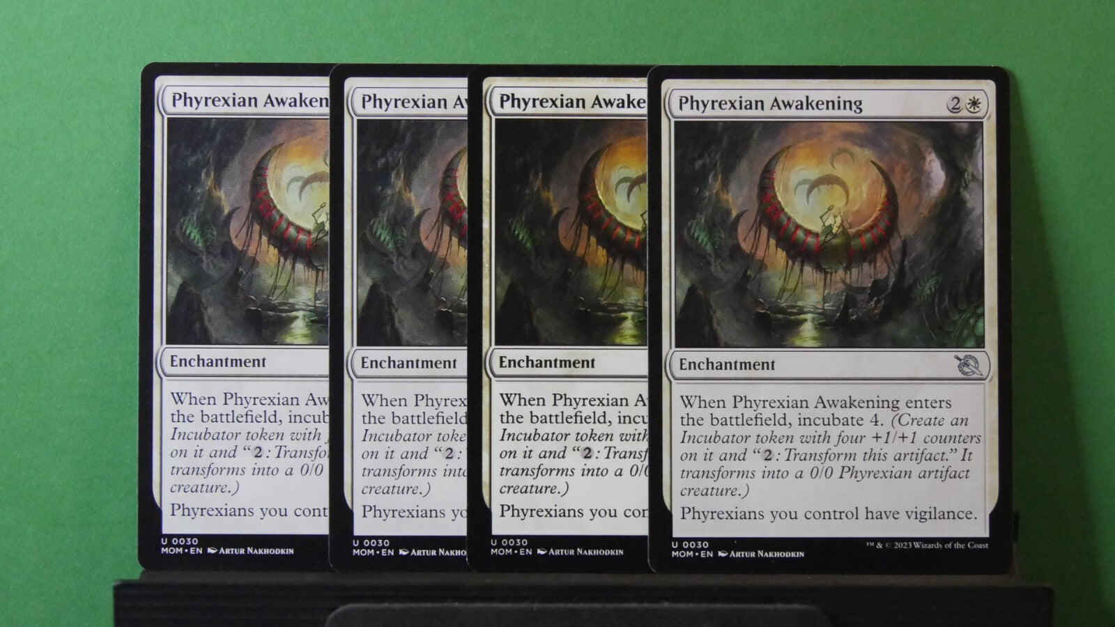 March of the Machine Phyrexian Awakening #30 playset featuring Phyrexian tribal and Incubate synergies.
