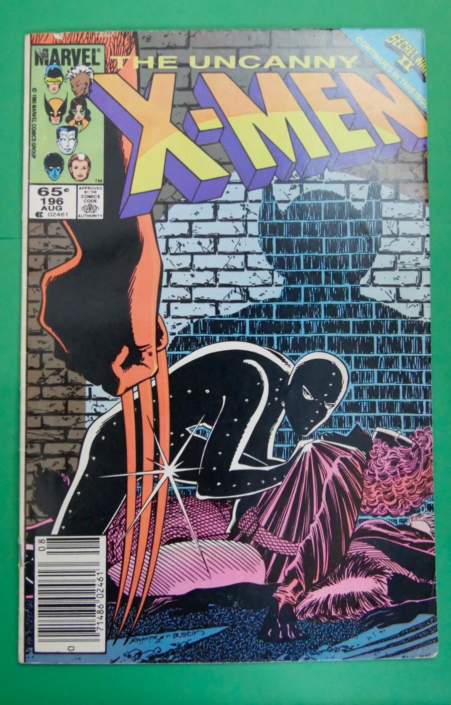 The Uncanny X-Men #196 (1985) Direct Edition cover with Wolverine confronting a masked attacker
