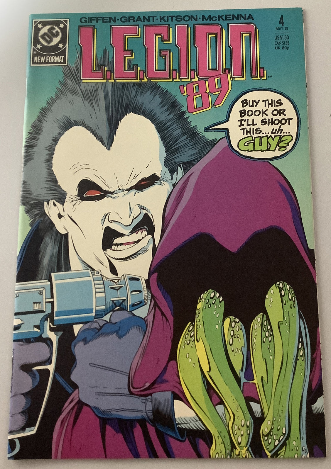 Cover of L.E.G.I.O.N. '89 #4 DC Comics 1989 featuring a villain holding a hostage at gunpoint with Lobo appearance.