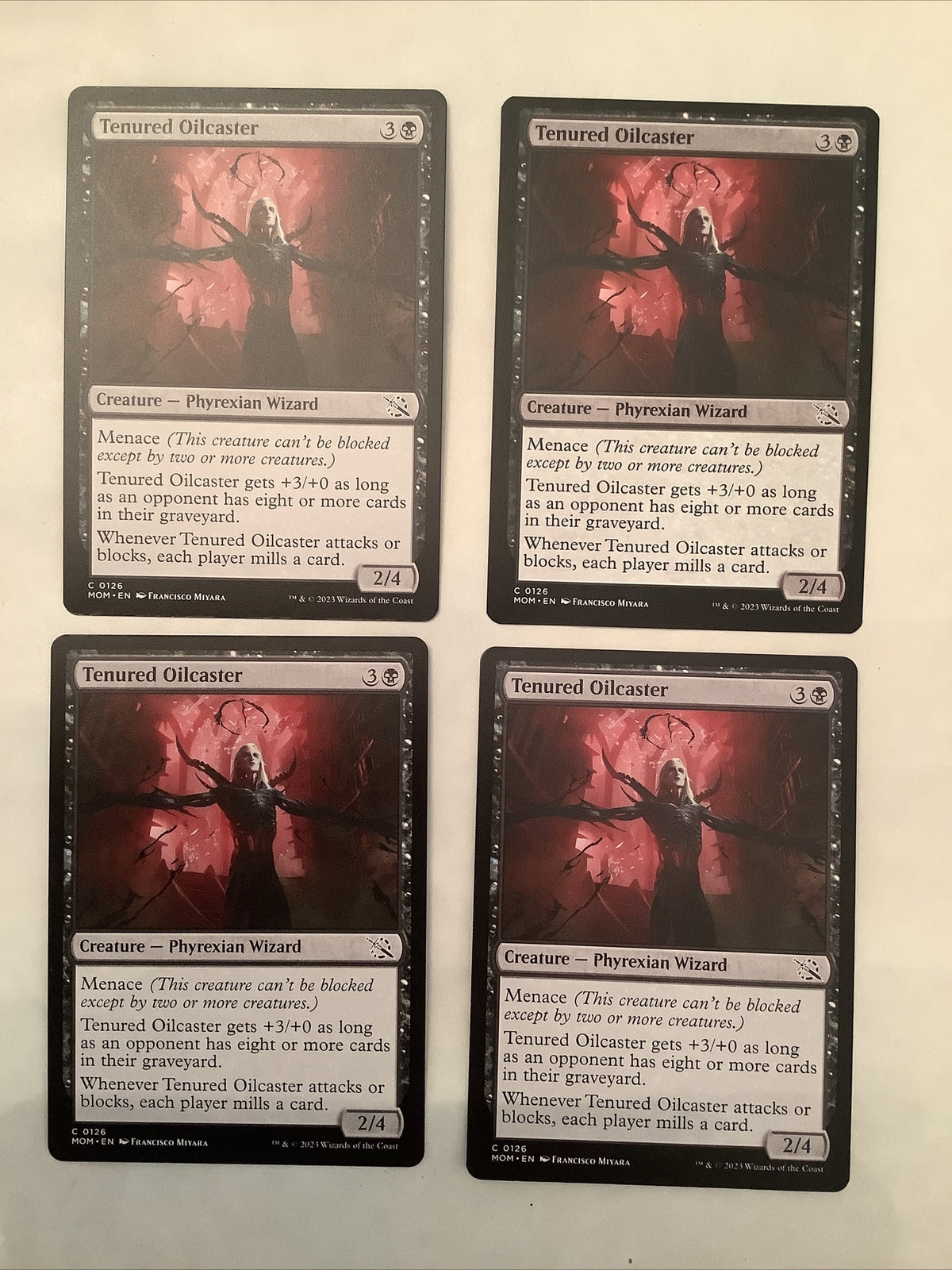 Magic: The Gathering card Tenured Oilcaster from March of the Machine, MOM 0126.
