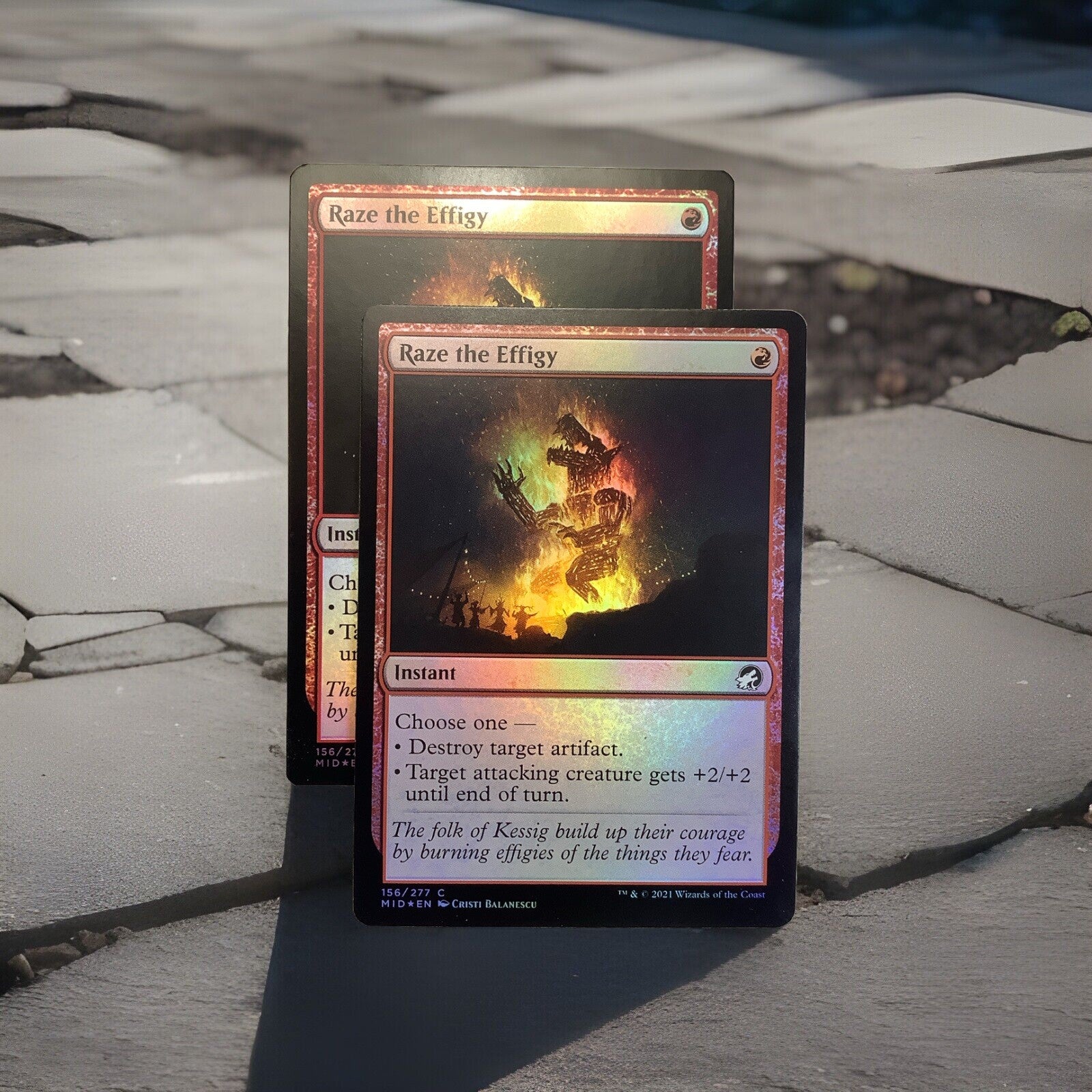 Foil Magic: The Gathering card Raze the Effigy from Innistrad: Midnight Hunt, MID 156/277.
