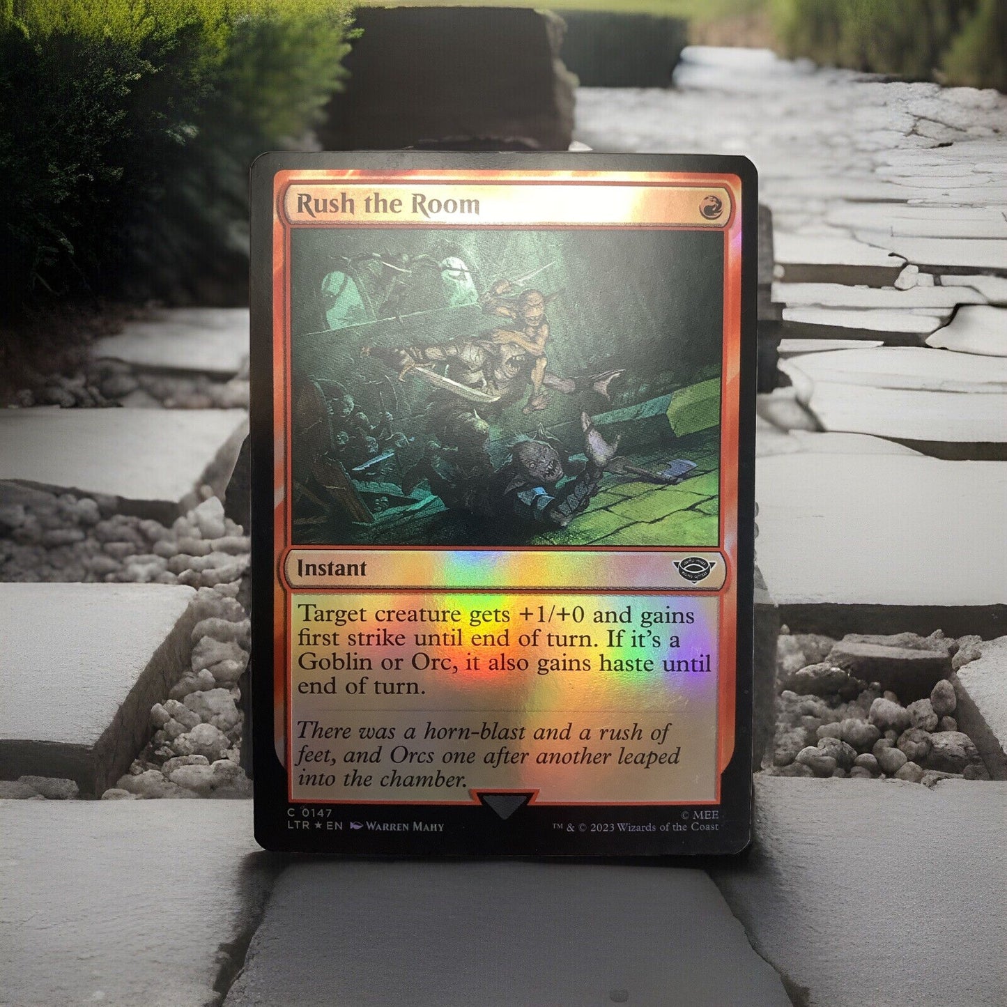 Foil Rush the Room MTG card (LTR 147) red instant close-up
