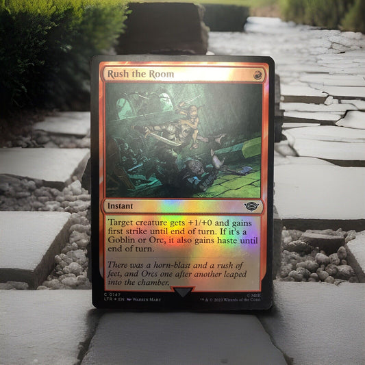 Foil Rush the Room MTG card (LTR 147) red instant close-up
