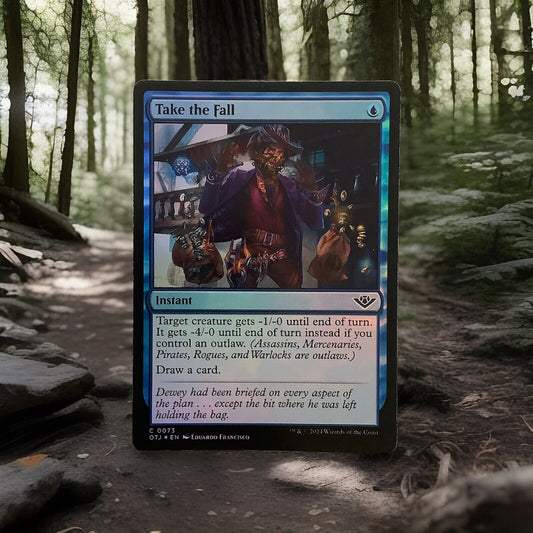 Magic: The Gathering foil Take the Fall instant card from Outlaws of Thunder Junction with reflective blue foil border and outlaw-themed artwork