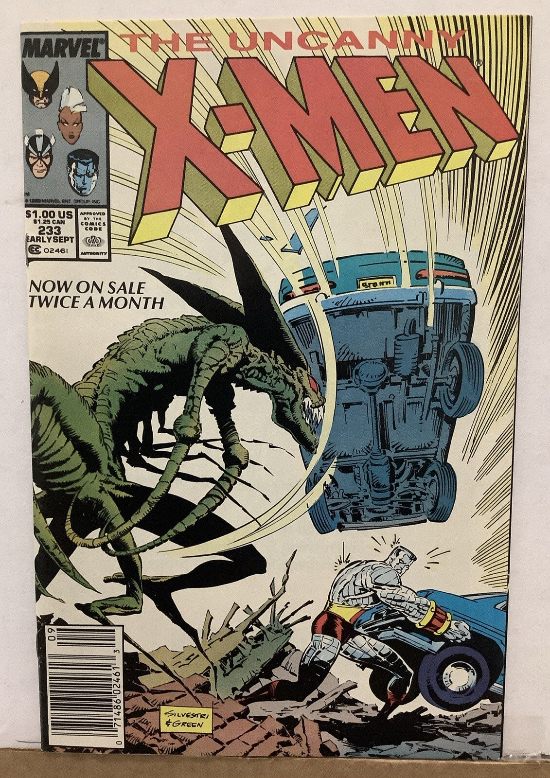 Uncanny X-Men #233 (1988) Newsstand Edition comic book from Marvel Comics featuring Colossus vs. the Brood.
