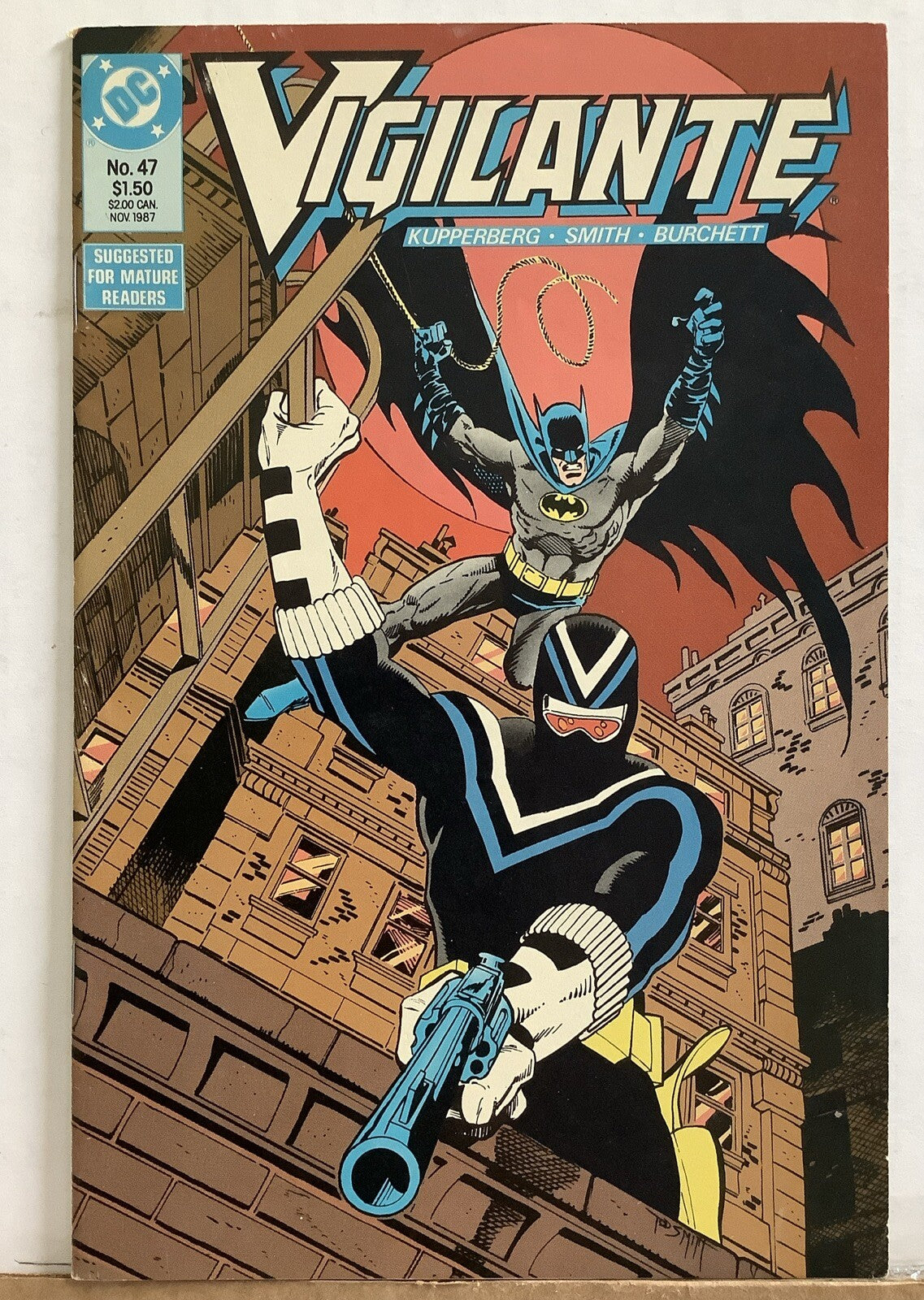 Vigilante #47 DC Comics 1987 cover featuring Vigilante and Batman rooftop scene