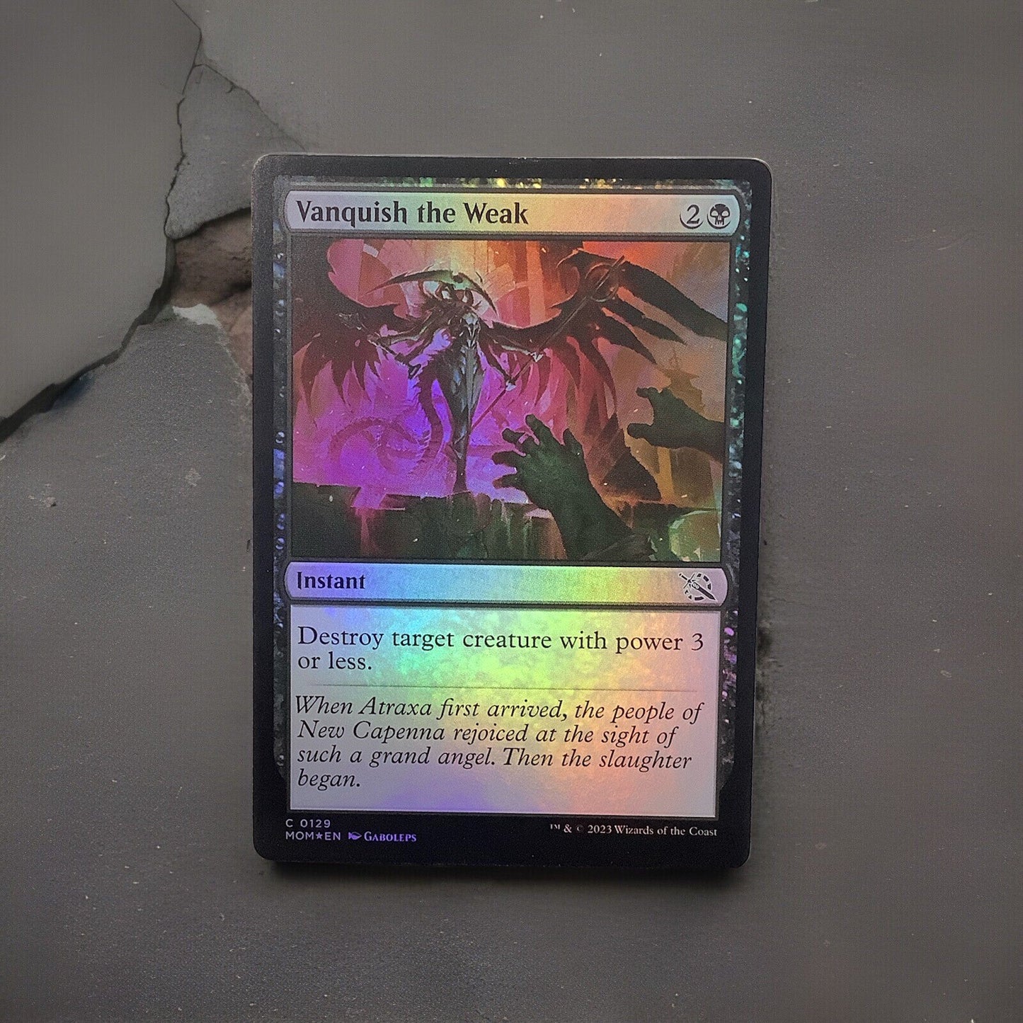Vanquish the Weak MOM 129 Foil from March of the Machine.