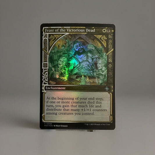 Feast of the Victorious Dead showcase foil enchantment card from March of the Machine The Aftermath 0080