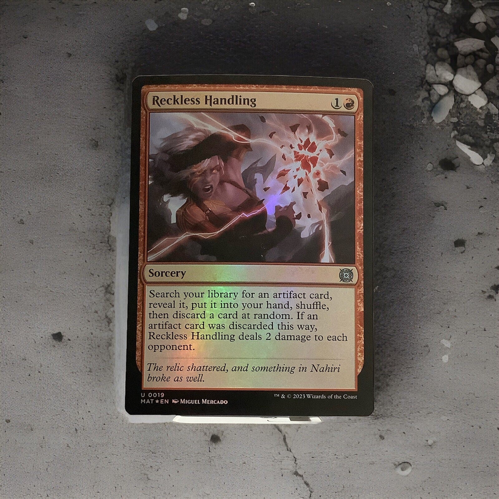 Reckless Handling #19 foil finish from March of the Machine: The Aftermath.